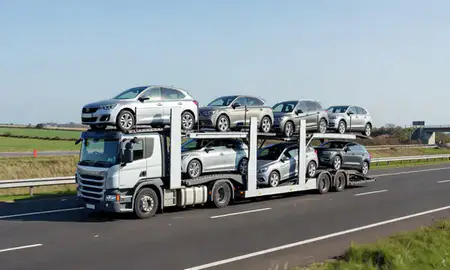 Multi-level car carrier on the motorway to Norfolk, United Kingdom