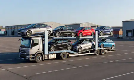 Car transporter loaded with vehicles in Great Yarmouth, Norfolk, United Kingdom