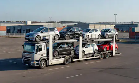 Car transporter loaded with vehicles in King's Lynn, Norfolk, United Kingdom