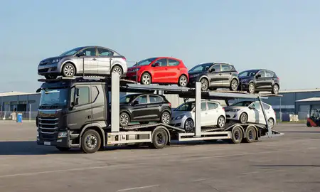 Car transporter loaded with vehicles in Norwich, Norfolk, United Kingdom