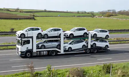 Multi-level car carrier on the motorway to Coatbridge, North Lanarkshire, United Kingdom