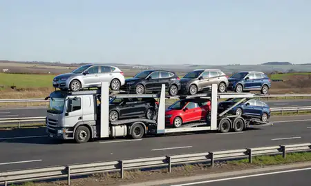 Multi-level car carrier on the motorway to Cumbernauld, North Lanarkshire, United Kingdom