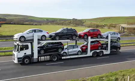 Multi-level car carrier on the motorway to North Yorkshire, United Kingdom