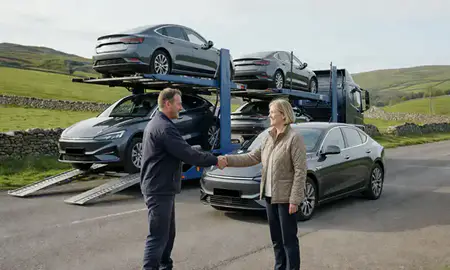 Vehicle owner beside their delivered car in North Yorkshire, United Kingdom