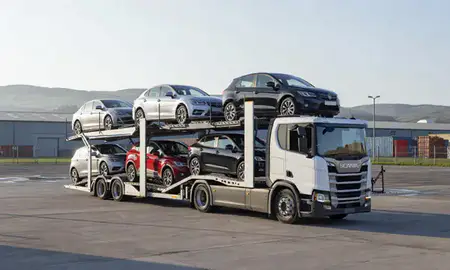 Car transporter loaded with vehicles in North Yorkshire, United Kingdom