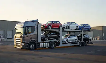 Car transporter loaded with vehicles in Harrogate, North Yorkshire, United Kingdom