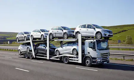 Multi-level car carrier on the motorway to Scarborough, North Yorkshire, United Kingdom