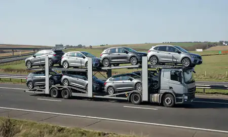 Multi-level car carrier on the motorway to Northamptonshire, United Kingdom
