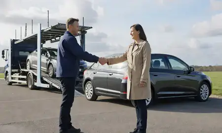 Vehicle owner beside their delivered car in Northamptonshire, United Kingdom