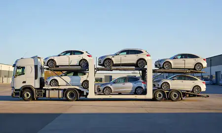 Car transporter parked in an industrial area of Northampton, Northamptonshire, United Kingdom
