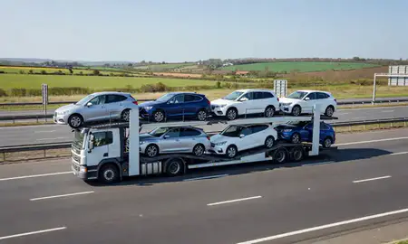 Multi-level car carrier on the motorway to Wellingborough, Northamptonshire, United Kingdom