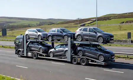 Multi-level car carrier on the motorway to Northumberland, United Kingdom
