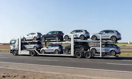 Multi-level car carrier on the motorway to Beeston, Nottinghamshire, United Kingdom