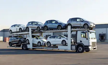 Car transporter loaded with vehicles in Carlton, Nottinghamshire, United Kingdom