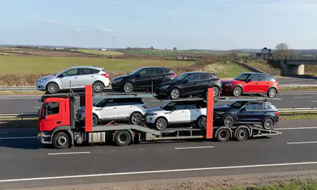Multi-level car carrier on the motorway to Mansfield, Nottinghamshire, United Kingdom