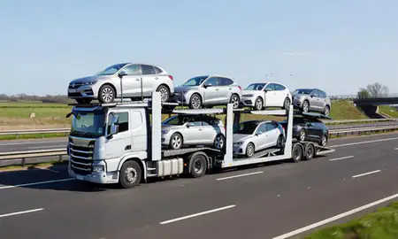Multi-level car carrier on the motorway to Newark-on-Trent, Nottinghamshire, United Kingdom