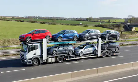 Multi-level car carrier on the motorway to Nottingham, Nottinghamshire, United Kingdom