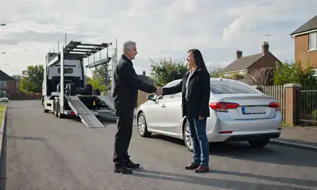 Vehicle owner beside their delivered car in Nottingham, Nottinghamshire, United Kingdom