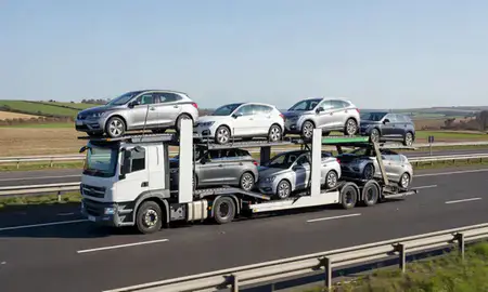 Multi-level car carrier on the motorway to Sutton-in-Ashfield, Nottinghamshire, United Kingdom