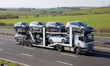 Multi-level car carrier on the motorway to Oxfordshire, United Kingdom