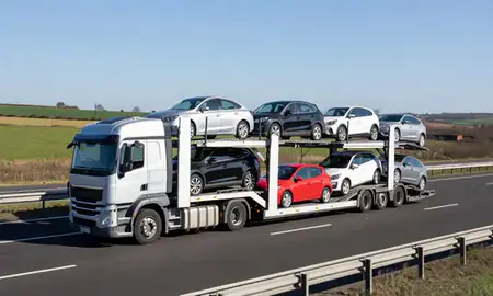 Multi-level car carrier on the motorway to Banbury, Oxfordshire, United Kingdom