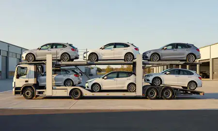 Car transporter parked in an industrial area of Banbury, Oxfordshire, United Kingdom