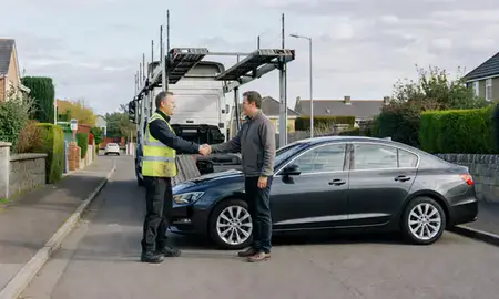 Vehicle owner beside their delivered car in Perth, Perth and Kinross, United Kingdom