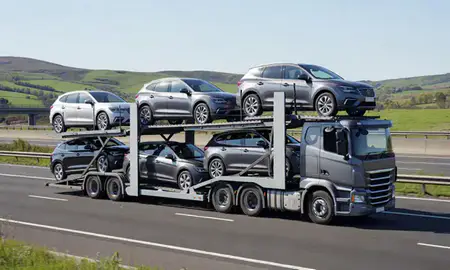 Multi-level car carrier on the motorway to Renfrewshire, United Kingdom