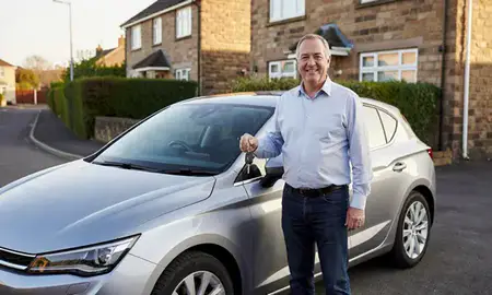 Car delivered to a driveway in Paisley, Renfrewshire, United Kingdom
