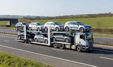 Multi-level car carrier on the motorway to Shrewsbury, Shropshire, United Kingdom
