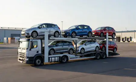 Car transporter loaded with vehicles in Shrewsbury, Shropshire, United Kingdom
