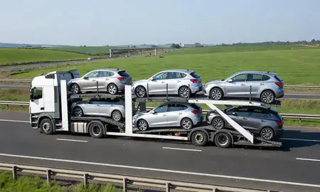 Multi-level car carrier on the motorway to Bridgwater, Somerset, United Kingdom