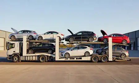 Car transporter parked in an industrial area of Taunton, Somerset, United Kingdom