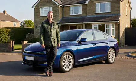 Customer with their delivered car in Weston-super-Mare, Somerset, United Kingdom