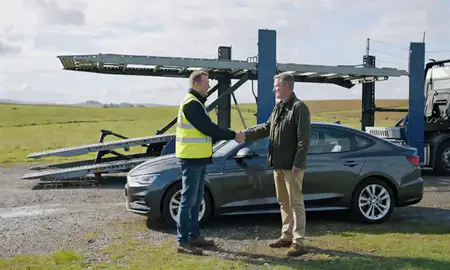 Vehicle owner beside their delivered car in South Ayrshire, United Kingdom