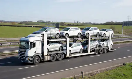 Multi-level car carrier on the motorway to South Lanarkshire, United Kingdom