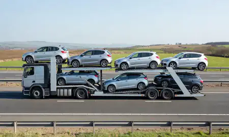 Multi-level car carrier on the motorway to East Kilbride, South Lanarkshire, United Kingdom