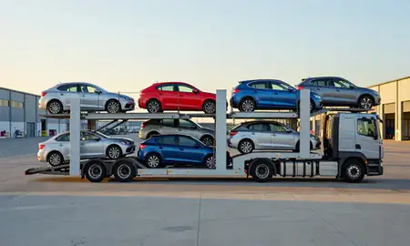 Car transporter parked in an industrial area of East Kilbride, South Lanarkshire, United Kingdom