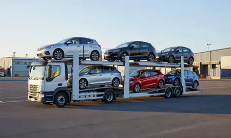 Car transporter loaded with vehicles in East Kilbride, South Lanarkshire, United Kingdom