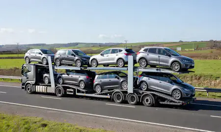 Multi-level car carrier on the motorway to Hamilton, South Lanarkshire, United Kingdom