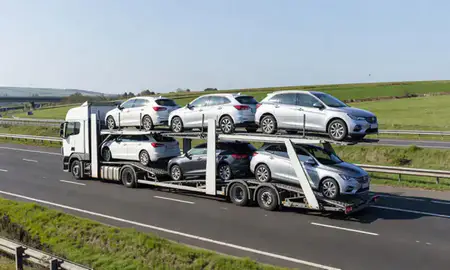 Multi-level car carrier on the motorway to South Yorkshire, United Kingdom