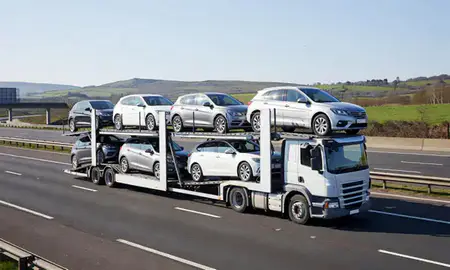 Multi-level car carrier on the motorway to Barnsley, South Yorkshire, United Kingdom