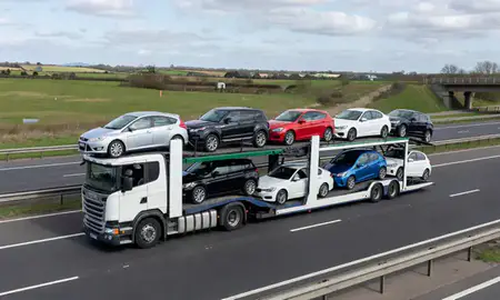 Multi-level car carrier on the motorway to Doncaster, South Yorkshire, United Kingdom