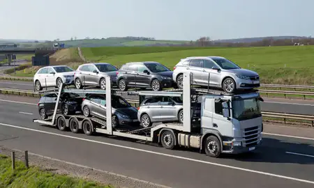 Multi-level car carrier on the motorway to Rotherham, South Yorkshire, United Kingdom