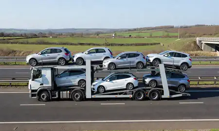 Multi-level car carrier on the motorway to Sheffield, South Yorkshire, United Kingdom