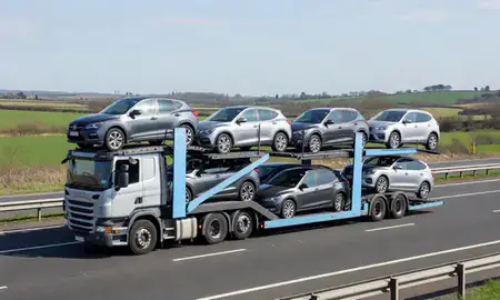 Multi-level car carrier on the motorway to Staffordshire, United Kingdom