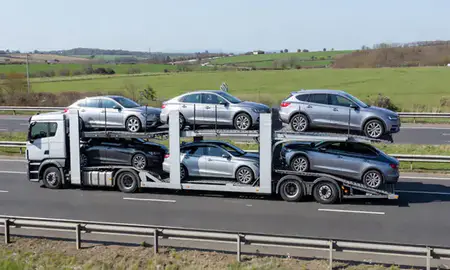 Multi-level car carrier on the motorway to Burton upon Trent, Staffordshire, United Kingdom