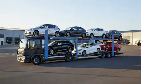Car transporter loaded with vehicles in Cannock, Staffordshire, United Kingdom