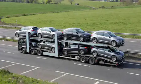 Multi-level car carrier on the motorway to Newcastle-under-Lyme, Staffordshire, United Kingdom