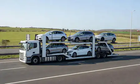 Multi-level car carrier on the motorway to Stafford, Staffordshire, United Kingdom